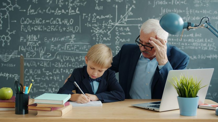 A parent helping a child with learning, representing VNN Learning's commitment to education